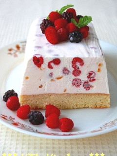 A picture of Citrus Ice Cream Cake with Berries and Yogurt.