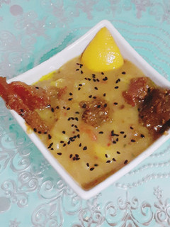A picture of Alu tarkari pori wali (Potato Curry).