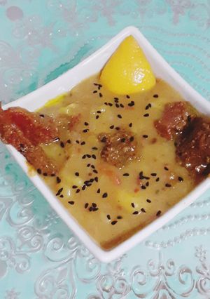A picture of Alu tarkari pori wali (Potato Curry).