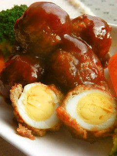 A picture of Quail Egg Meatballs in Sweet Vinegar Ankake Sauce.