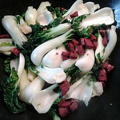 A picture of Bok Choy with Cantonese Roast Pork.