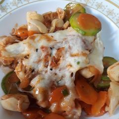 A picture of Tortellini with veggies.