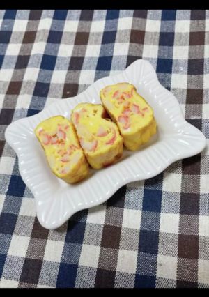 A picture of Japanese-Style Tamagoyaki with Imitation Crab and White Dashi (1 Egg Version).