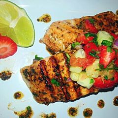 A picture of Mojito Lime grilled Salmon & Strawberry Pineapple Pico`.