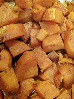 A picture of roasted zesty orange sweet potatoes.