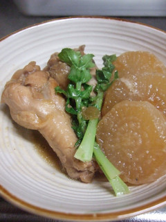 A picture of Chicken Drumsticks & Daikon Radish Simmered with Miso & Soy Sauce.