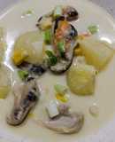 Seafood chowder with coconut, corn and mussels