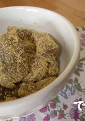 A picture of Brown Sugar Gyuuhi Covered in Kinako Soy Flour.