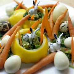 A picture of Arugula spicy salad with baby carrot and eggs.