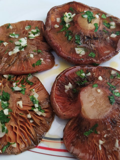 Una foto de Rovellons al horno riquísimos. Receta también de mi amiga Roser