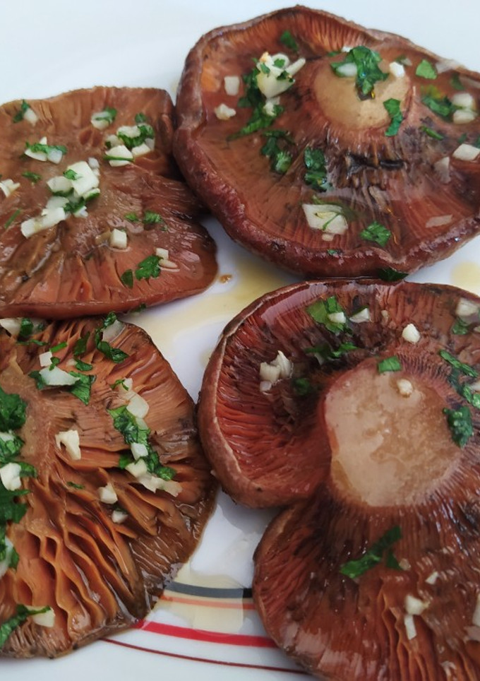 Una foto de Rovellons al horno riquísimos. Receta también de mi amiga Roser