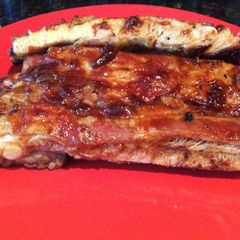 A picture of Oven Baked Pork Ribs with BBQ Sauce (Meat that comes off the bone).