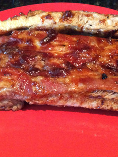 A picture of Oven Baked Pork Ribs with BBQ Sauce (Meat that comes off the bone).