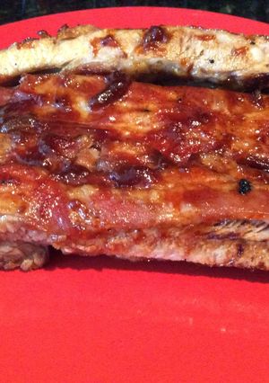 A picture of Oven Baked Pork Ribs with BBQ Sauce (Meat that comes off the bone).