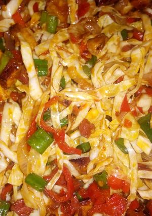 A picture of Plantain,sausage vegetable sauce.