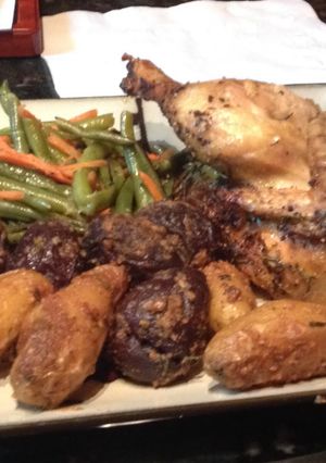 A picture of Roasted Cornish Hens, Green Beans, & Roasted Fingerling Potatoes.