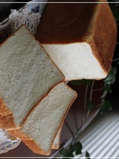 A picture of A Little Luxurious - Silky Smooth Milk Shokupan - Square Pullman Bread Loaf.