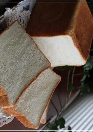 A picture of A Little Luxurious - Silky Smooth Milk Shokupan - Square Pullman Bread Loaf.