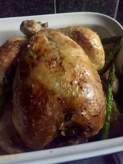 A picture of Sophie's garlic roast chicken, paprika carrots & asparagus and scored potatoes..
