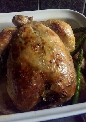 A picture of Sophie's garlic roast chicken, paprika carrots & asparagus and scored potatoes..