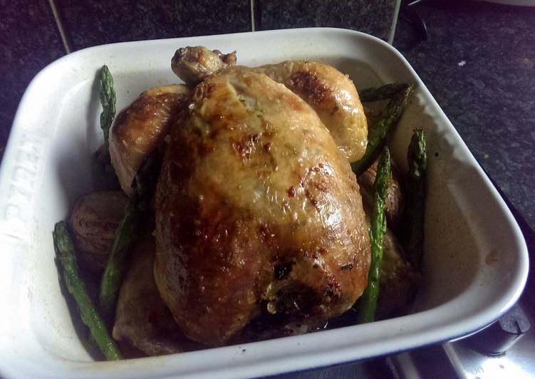 Sophie's garlic roast chicken, paprika carrots &amp; asparagus and scored potatoes.