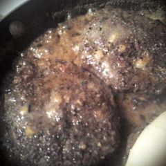 A picture of Double cheesy bacon cheeseburgers.