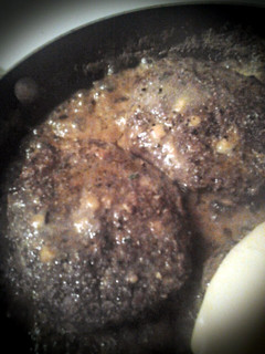 A picture of Double cheesy bacon cheeseburgers.