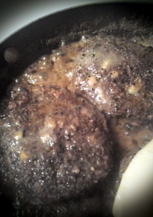 A picture of Double cheesy bacon cheeseburgers.