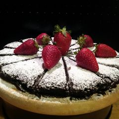 A picture of AMIEs Flourless CHOCOLATE Cake.