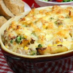 A picture of Baked Green pea with white sauce.