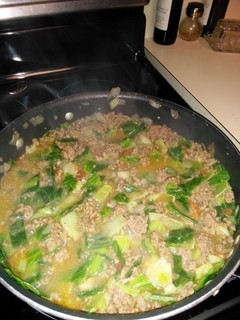 A picture of Yummy cabbage and hamburger.