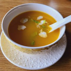 A picture of Red pumpkin soup.