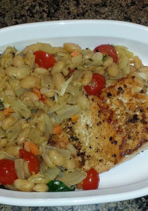 A picture of Salmon with white beans.