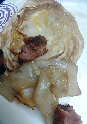 A picture of Balsamic vinegar roasted cabbage and sausage.