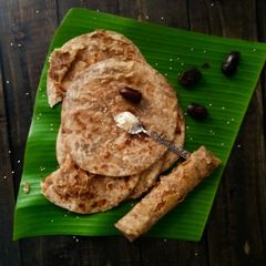 A picture of Sesame seeds and dates puran poli.