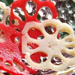 A picture of For Osechi and Special Occasions: Vibrant Red and White Vinegar-Pickled Lotus Root.