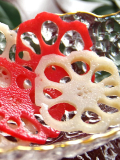 A picture of For Osechi and Special Occasions: Vibrant Red and White Vinegar-Pickled Lotus Root.