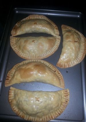 A picture of Baked chicken and Bacon empanadas.