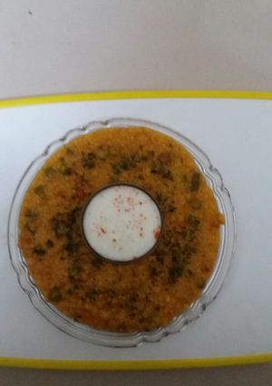 A picture of Broken wheat pulao.