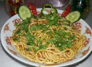 صورة لوصفة معكرونة ببندورة🍝🍅🌿