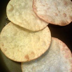 A picture of how to make homemade tostata shells.