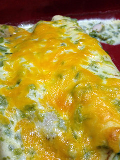 A picture of Chicken Enchiladas with Green Chile Sour Cream Sauce.