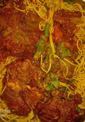 A picture of Cinnamon chicken with veggie pasta.