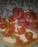 Pizzas Caseras (opciones: queso, salame o tomate)