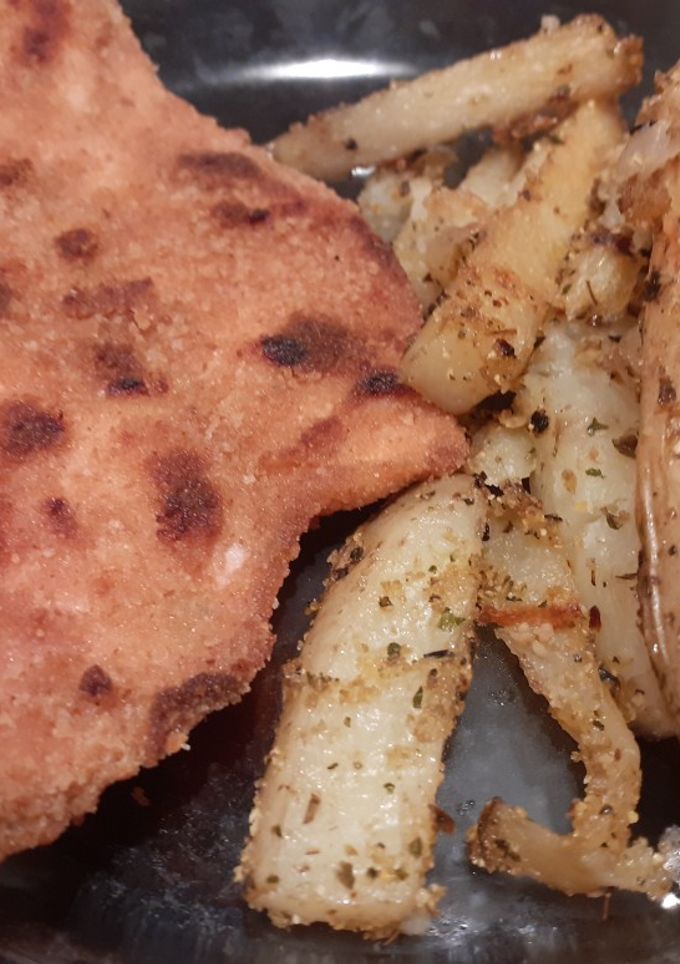 Una foto de Papas al horno Súper CROCANTES!!