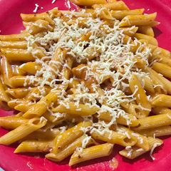 A picture of Red sauce cheesy pasta.