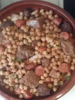 Una foto de Arroz al horno (mejor con el cocido del día anterior)