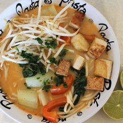 A picture of Thai Red Curry Noodle Soup with Crispy Tofu.