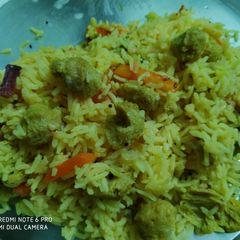 A picture of Tomato bhath with soya crunch.
