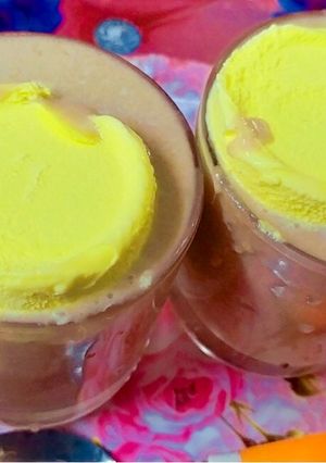 A picture of Chikoo milkshake with butterscotch ice cream.